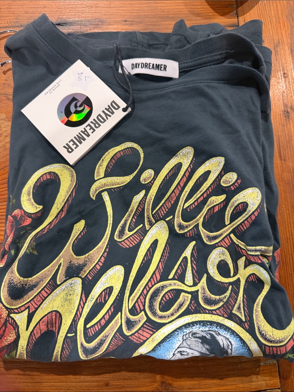 Daydreamer Black Tee with Yellow and Red Script Graphic